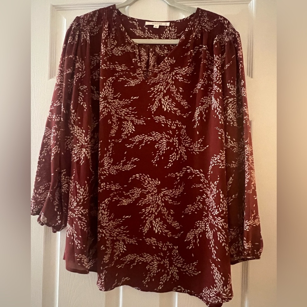 2X orange with white print